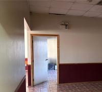 Puerta de acceso a oficina desde el holl