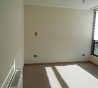 dormitorio principal en suite con wolking closet