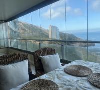 Terraza cerrada con cristales de vidrio sistema plegable
