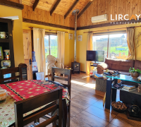 cielo raso con vigas a la vista