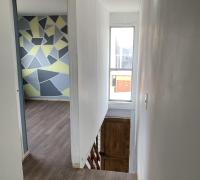 Vista desde el segundo nivel del dúplex, donde se distribuyen los tres dormitorios