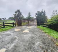 portón acceso parcelación controlado