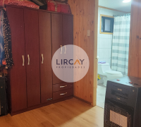 dormitorio principal con baño en suite