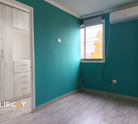 dormitorio con aire acondiconado
