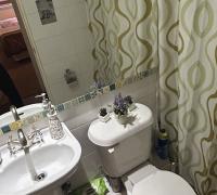 Baño visita