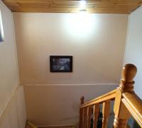 VISTA DE ESCALA DESDE 2DO PISO HACIA 1ER PISO