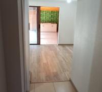 acceso a casa vista de pasillo que conecta living comedor y cocina