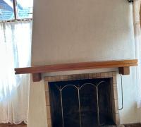 VISTA FRONTAL CHIMENEA UBICADA EN LIVING