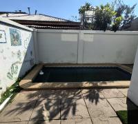 patio exterior casa vista piscina
