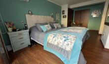 Dormitorio en suite, walking closet y sala de estar