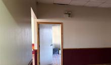Puerta de acceso a oficina desde el holl