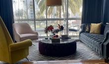 Living en desnivel piso parquet vitrificado, vista despejada con salida a terraza acogedora 