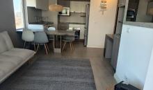 Disfruta de la eficiencia y el estilo en este departamento de 3D y 2B, diseñado para quienes valoran la conectividad y la vista al mar.