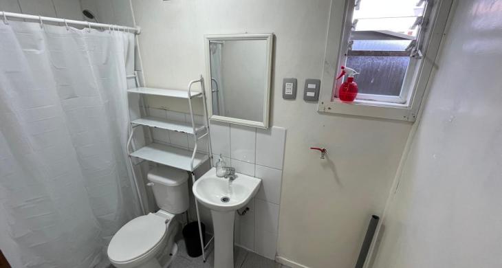 Baño con instalación de lavadora 