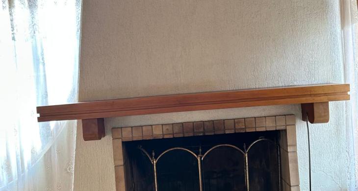VISTA FRONTAL CHIMENEA UBICADA EN LIVING