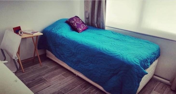 segundo dormitorio con clóset, orientación norte