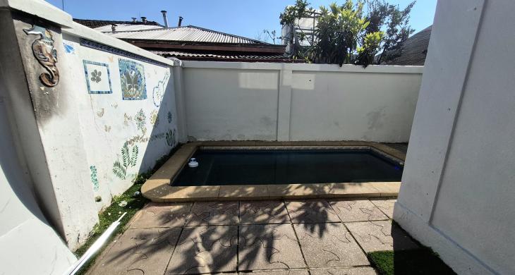 patio exterior casa vista piscina