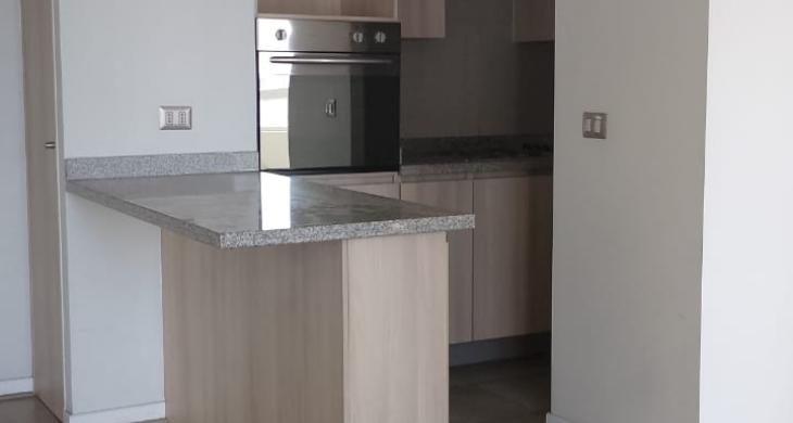 fachada de la cocina se integra a living-comedor